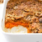Styled sweet potato casserole closeup in a casserole dish