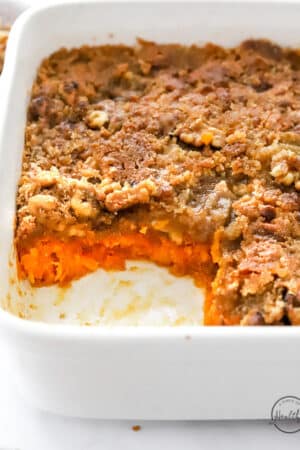 Styled sweet potato casserole closeup in a casserole dish