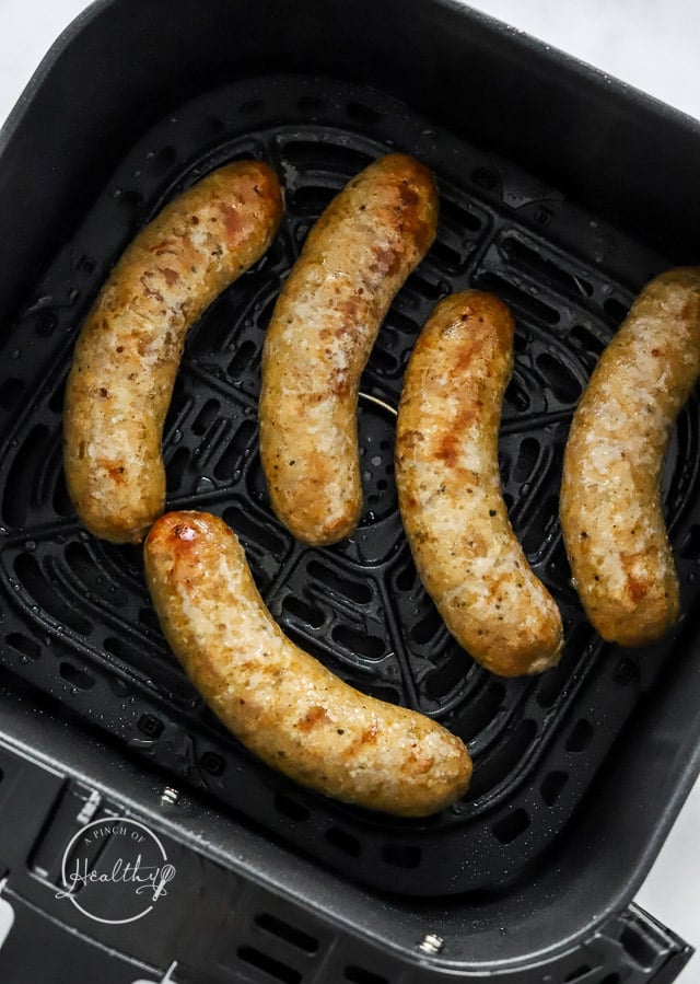 Air Fryer Bratwurst in fryer basket