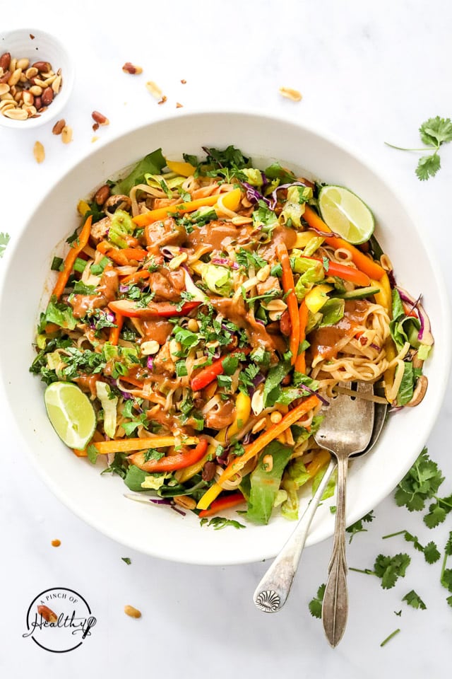 Thai noodle salad in a white serving bowl
