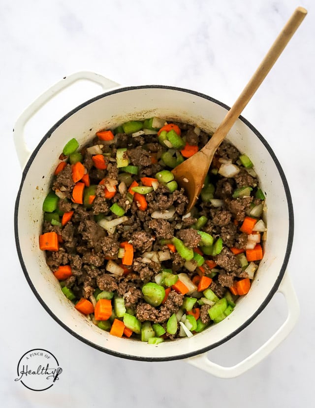Cooked beef with veggies in a pot