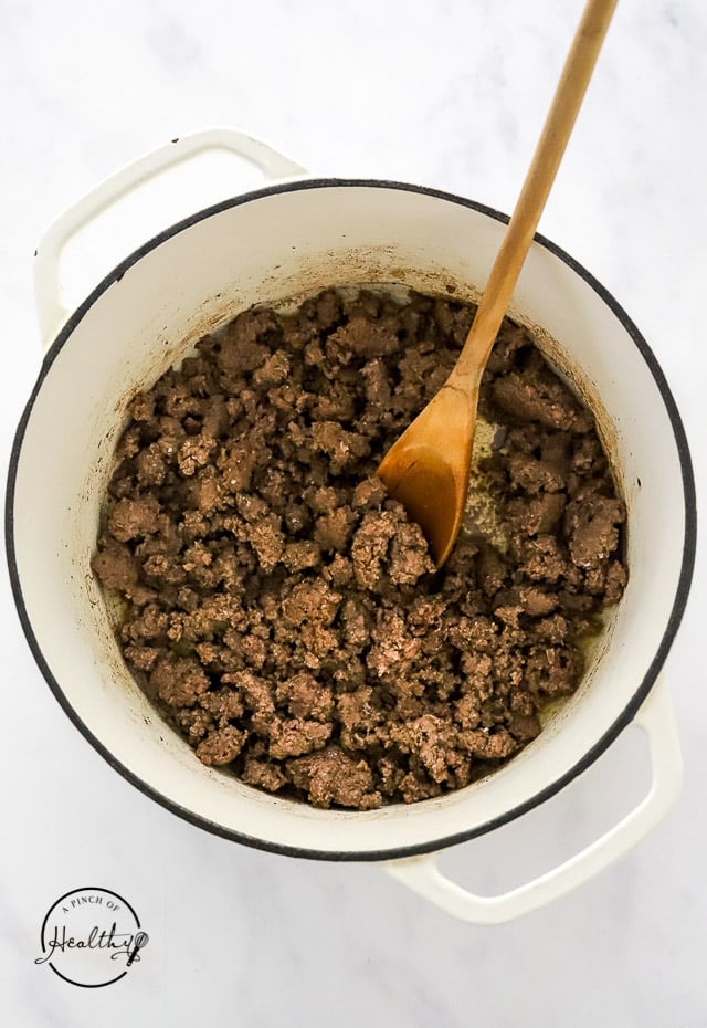 cooking ground beef in a pot