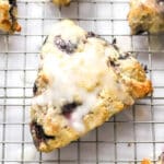 lemon blueberry scones on a cooling rack