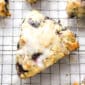lemon blueberry scones on a cooling rack