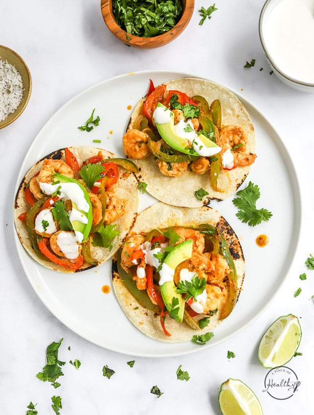 overhead shot of three shrimp fajitas