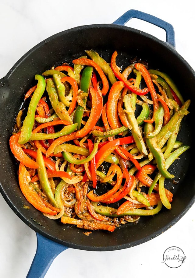veggies cooking in a pan