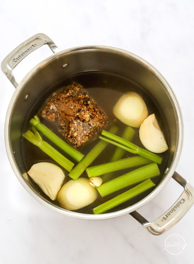 cooking broth in a pot