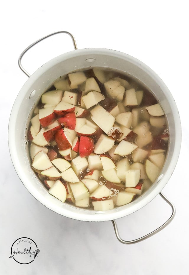 cooking potatoes in a pot with water