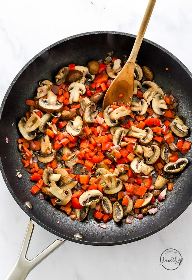 cooking veggies in a pan