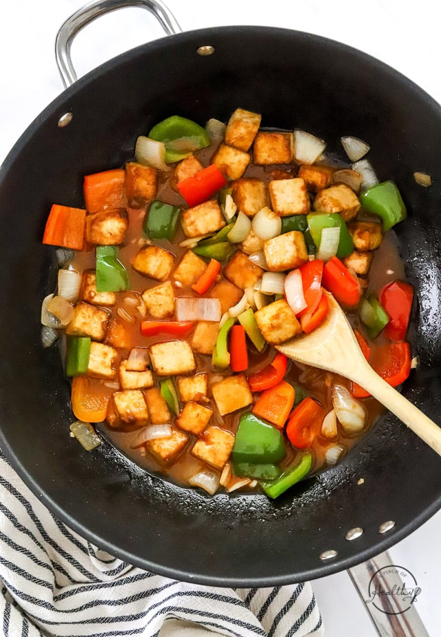 Styled sweet and sour tofu in a wok