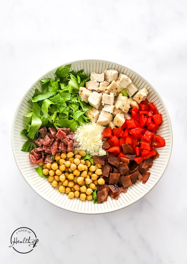 Jennifer Aniston salad recipe ingredients in a bowl separated