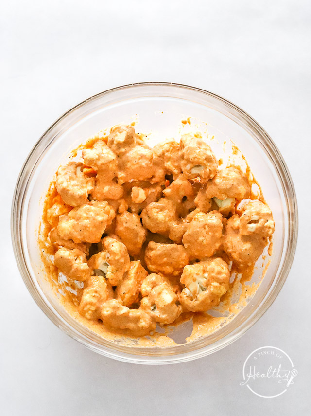 Coated cauliflower in glass bowl