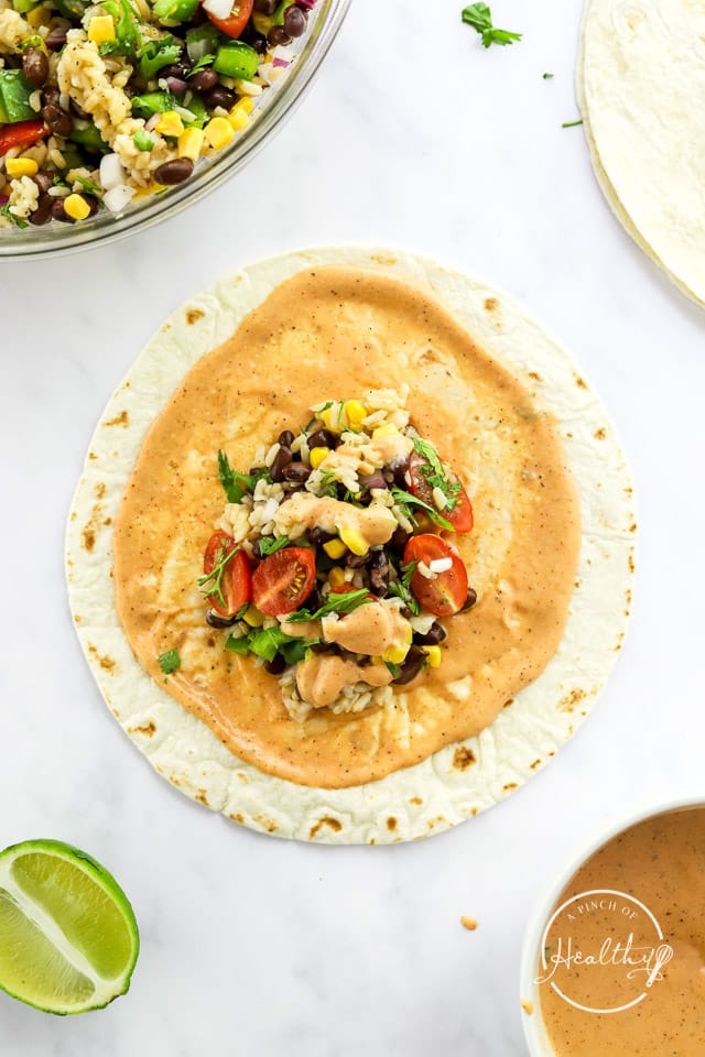assembling bean burritos