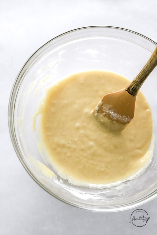 batter mixing in a clear glass bowl