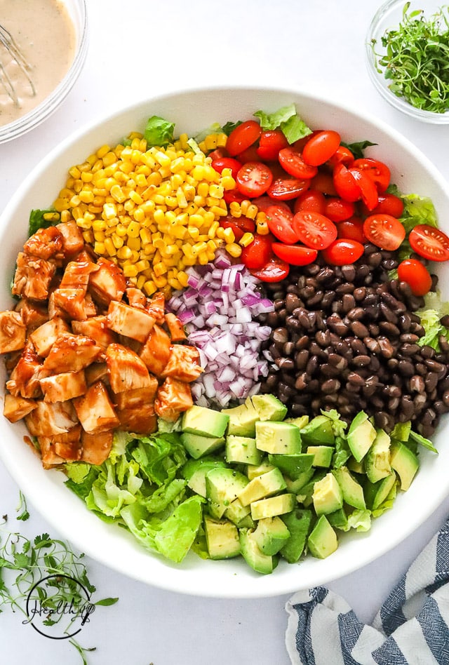 assembled BBQ chicken salad with separated ingredients