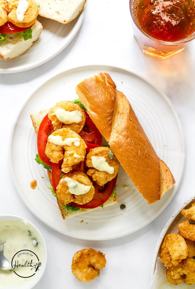 Shrimp Po' Boy on a plate open faced
