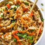 Chicken Pad Thai shot closeup in a white bowl