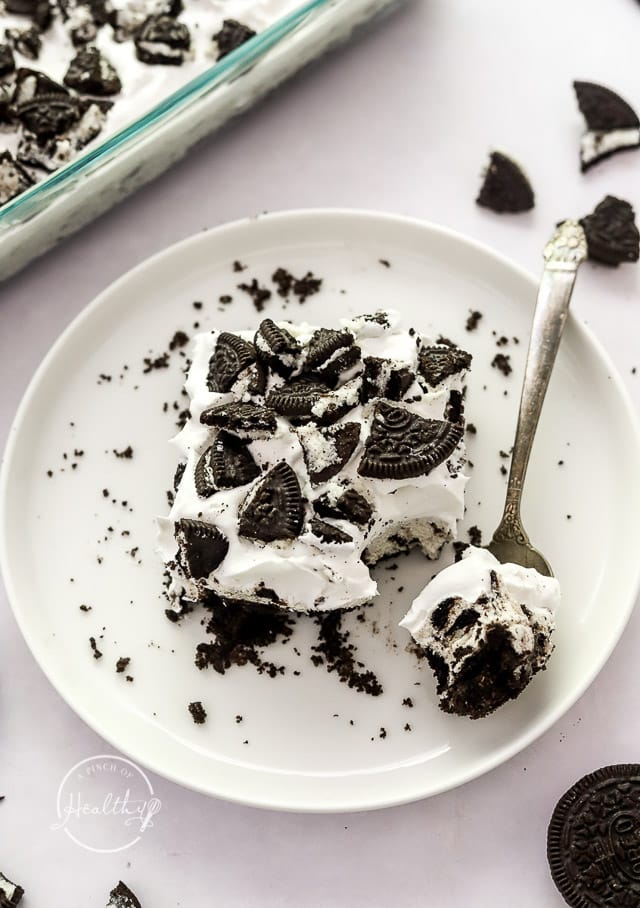 slice of no bake Oroe cheesecake on a plate with fork