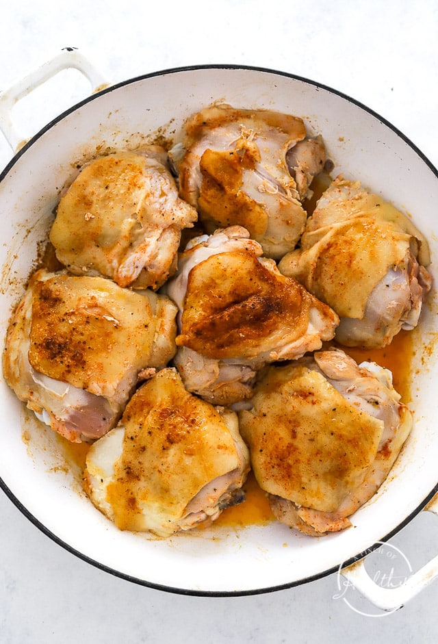 searing chicken in a pan