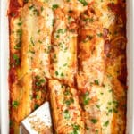 Serving Cheese Manicotti out of a baking dish