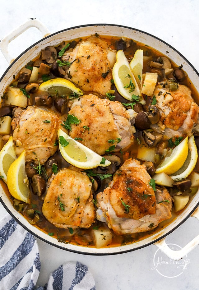 Braised Chicken Thighs shot overhead in an enameled pot