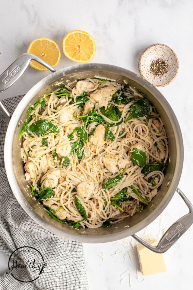 finished lemon chicken pasta in a large metal pot.