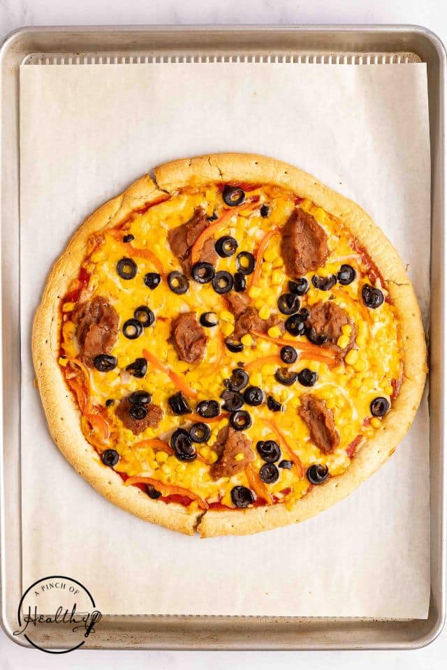 pizza with toppings after being baked.
