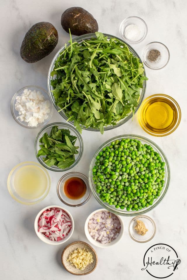 pea salad ingredients shot from overhead in separate bowls