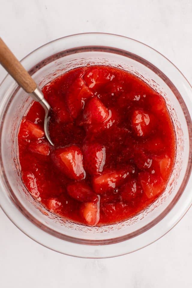 cooked strawberry sauce in a glass bowl after being chilled