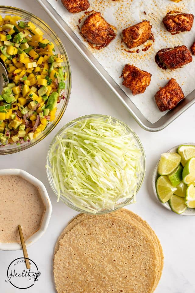 Finished ingredients for salmon tacos laid out and waiting to be assembled.
