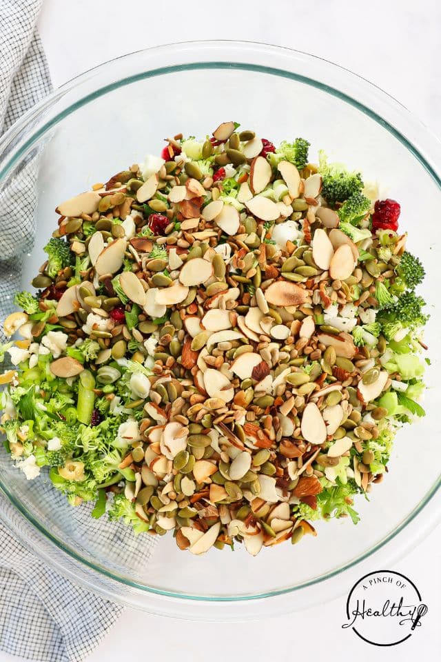 Broccoli cauliflower salad with the seeds and nuts on top.