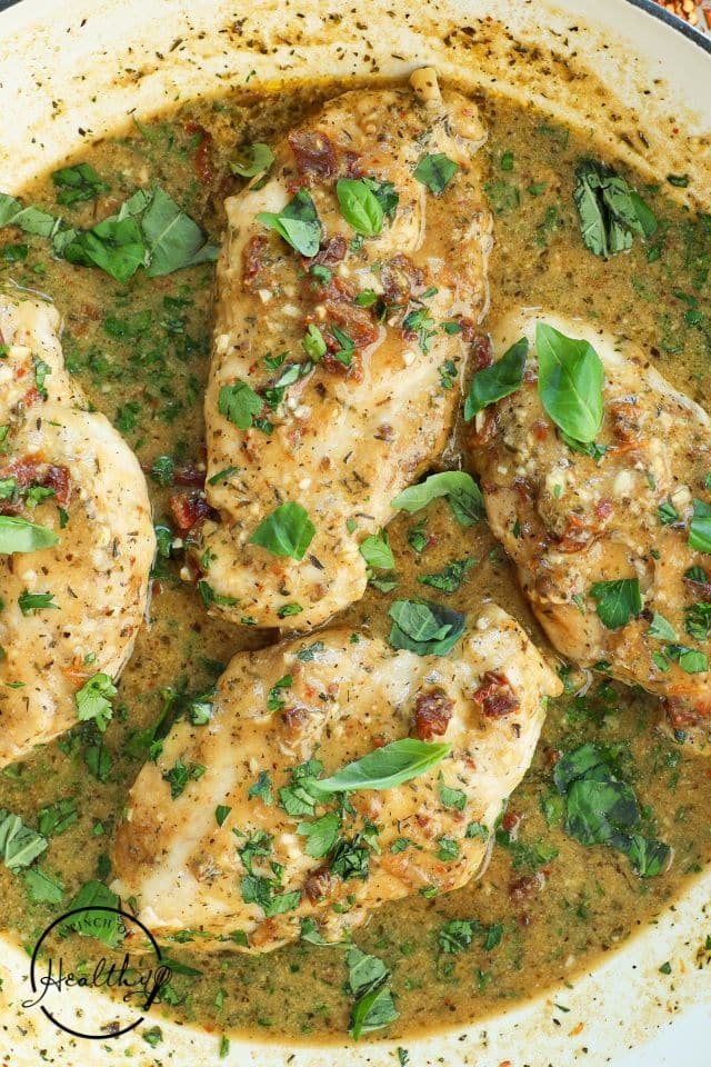 Marry Me Chicken in a large Dutch Oven garnished with parsley.
