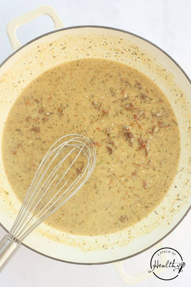 Marry Me Chicken sauce in the same Dutch Oven the chicken was cooked in.