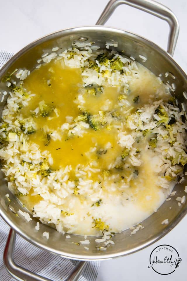 Broccoli rice casserole ingredients after the milk is added.