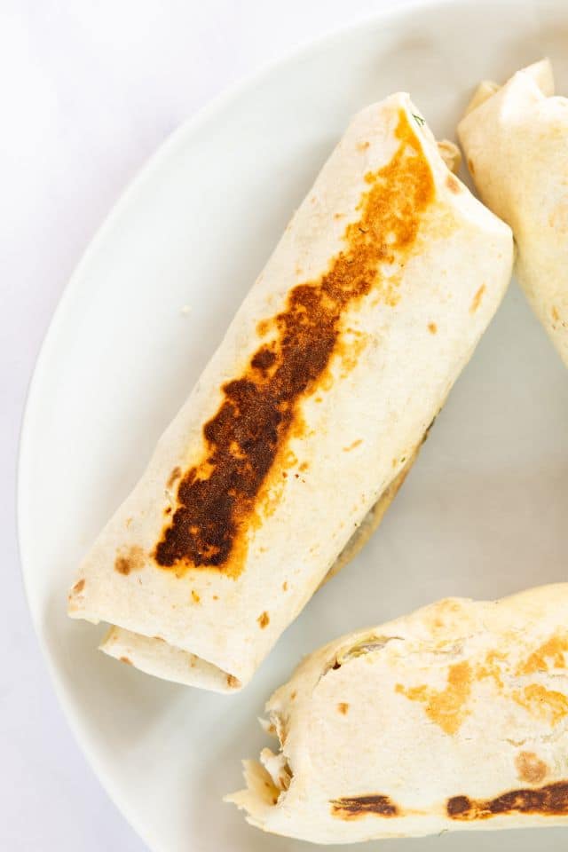 Grilled chicken ranch wrap before being cut in half.