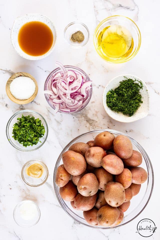 Ingredients for German Potato Salad in separate containers.