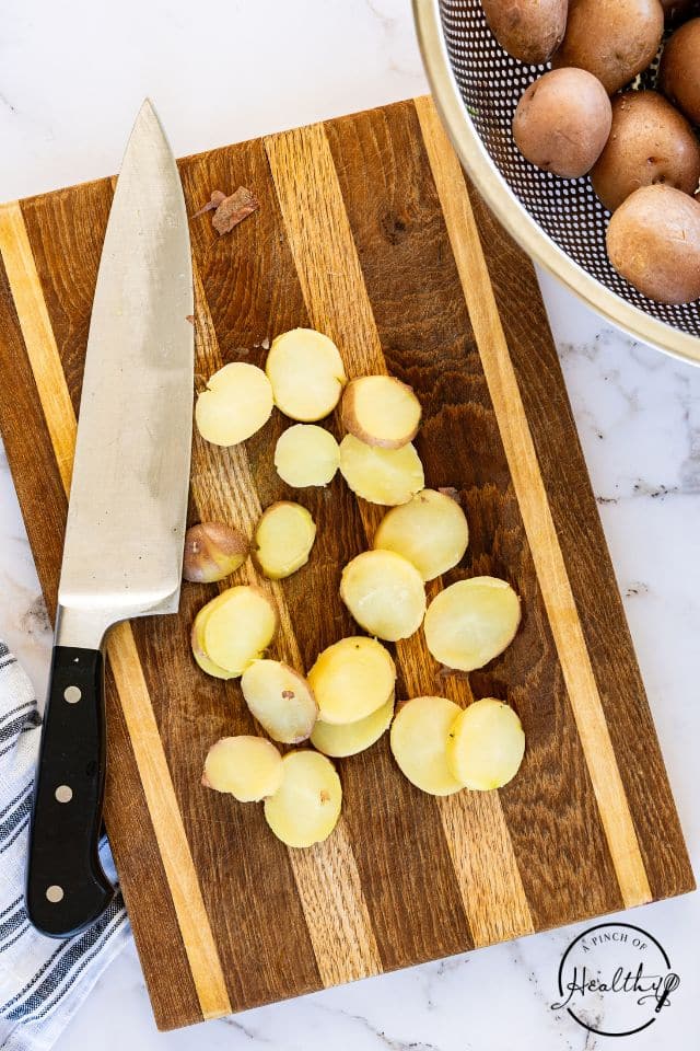 Potatoes for German potato salad after being peeled and sliced.