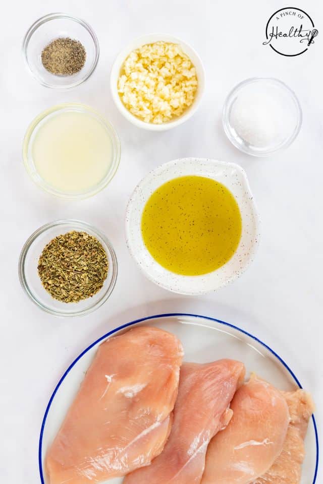 Ingredients for chicken marinade in separate bowls.