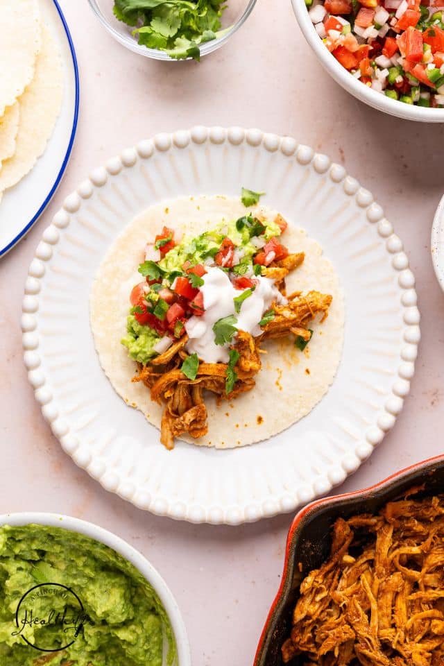 One shredded chicken taco after being built.