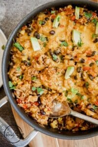 Chicken fiesta skillet with avocado and cilantro on top