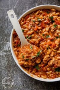 Goulash recipe in a large white serving bowl